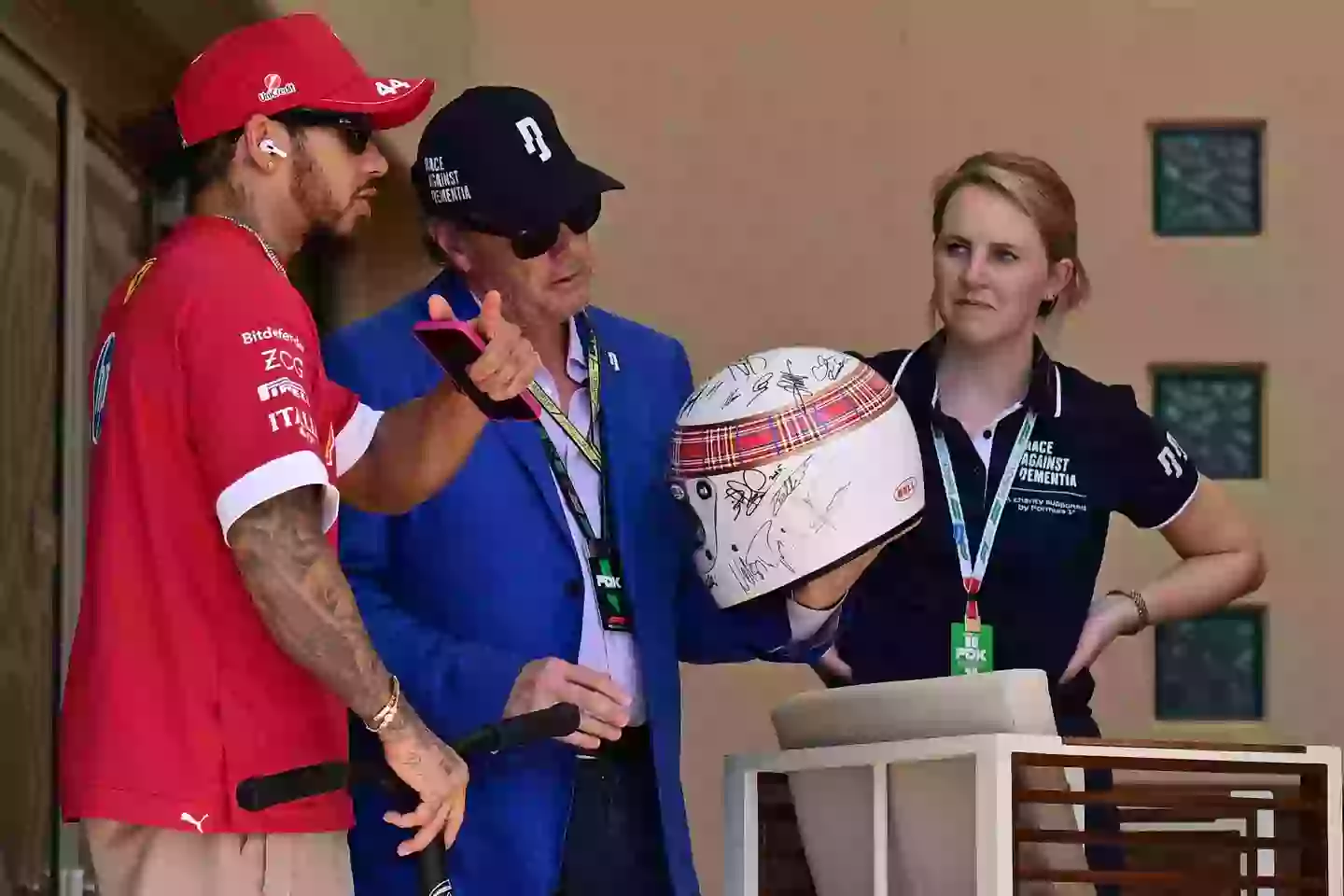 Michael Schumacher has signed Jackie Stewart's helmet. Image: Getty