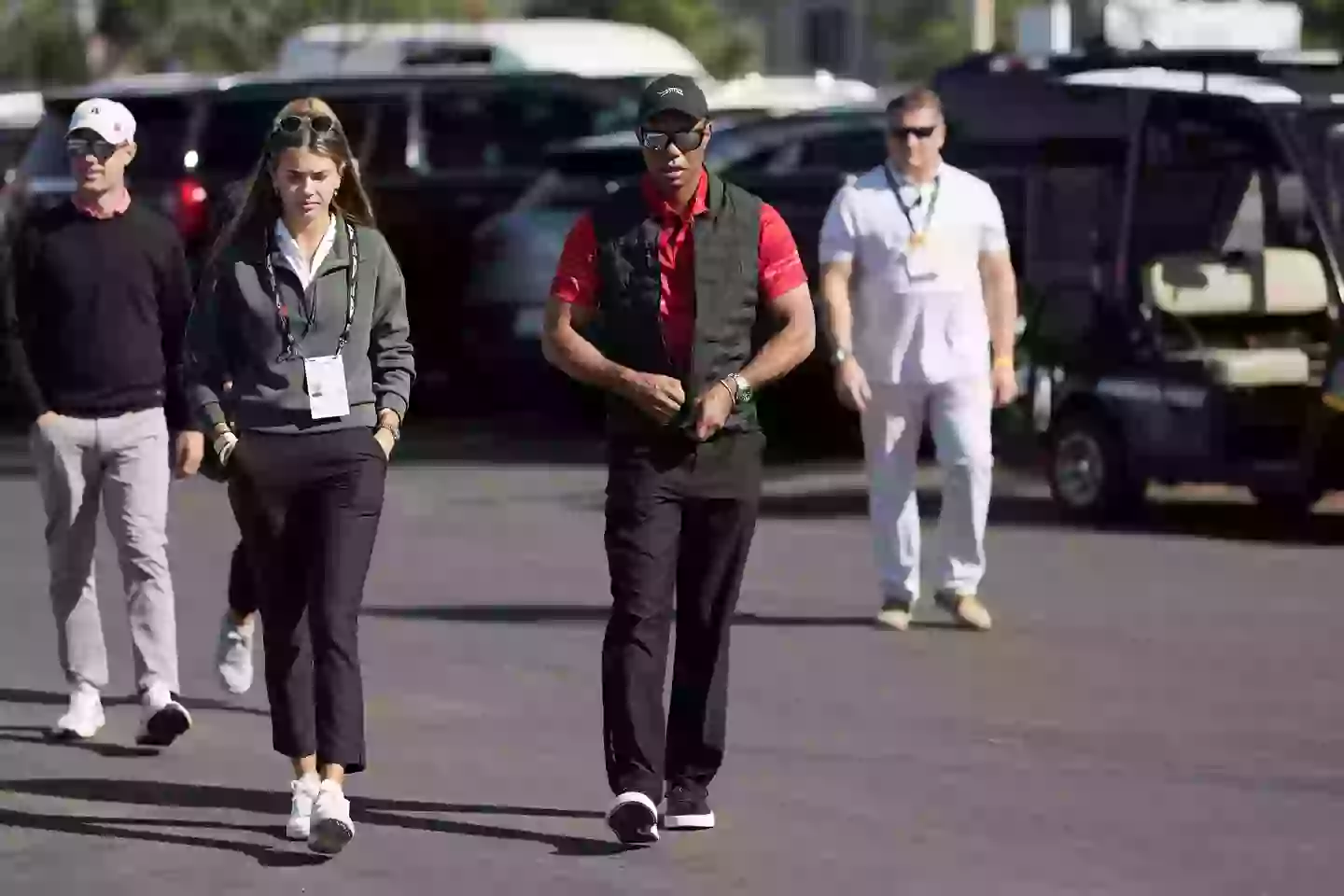 Tiger Woods arrives with Kai Trump at The Genesis Invitational 2025 in February. Image: Getty