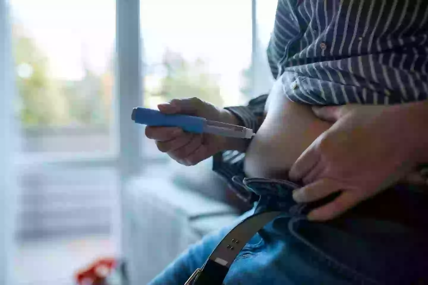 Some have claimed that 'microdosing' weight loss drugs can lead to a longer life (Getty Stock)