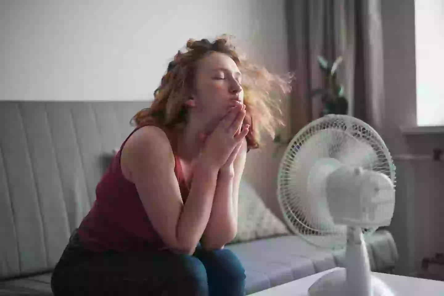 A doctor has issued a warning about the hidden health risks of sleeping with a fan on all night. (MementoJpeg/Getty)