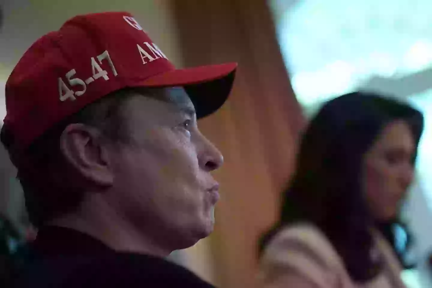 Investors argue Musk is more focused on his political agenda than running his companies. (Andrew Harnik/Staff/Getty)