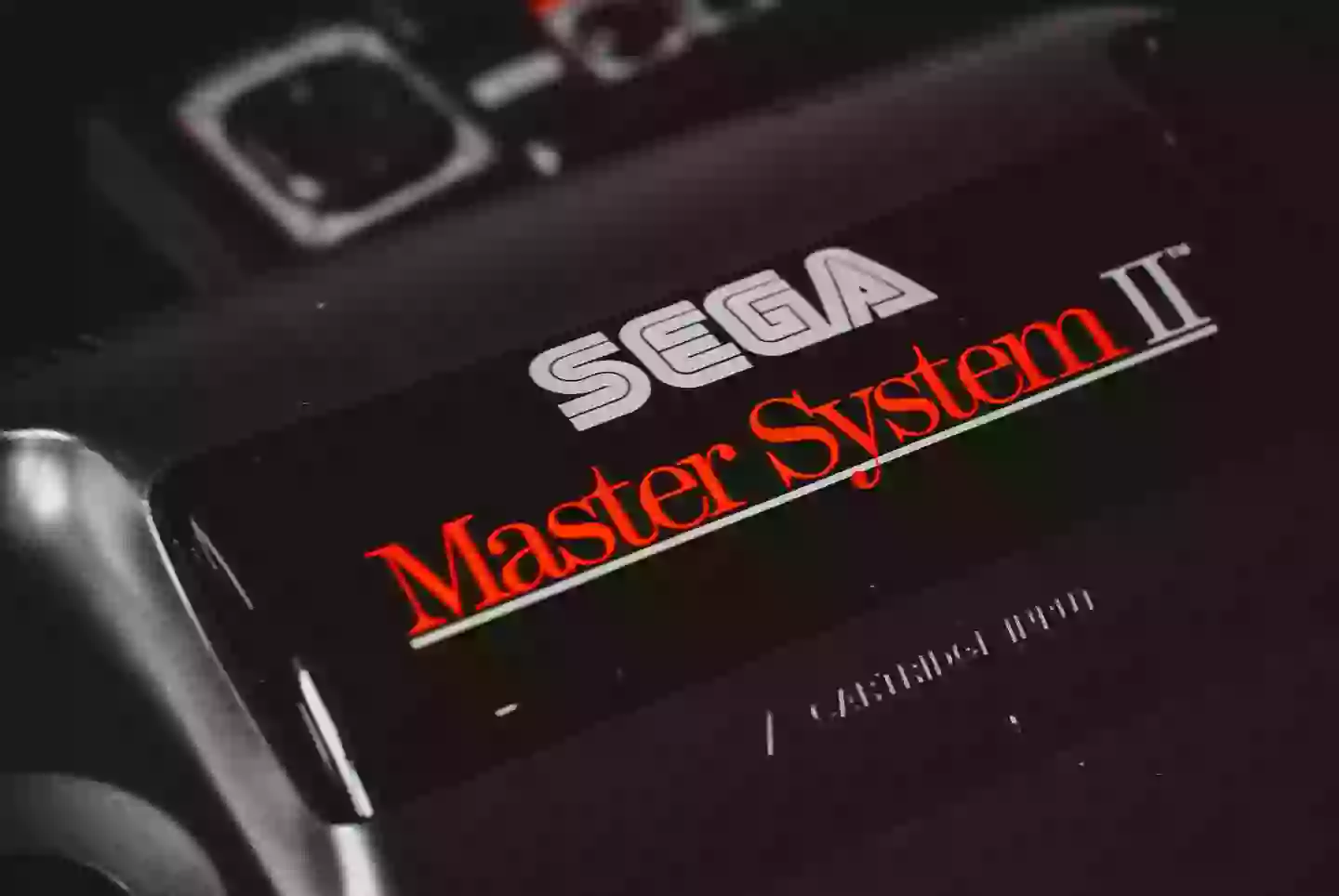 The SEGA Master System II, the model that followed the original design (pictured, main) /