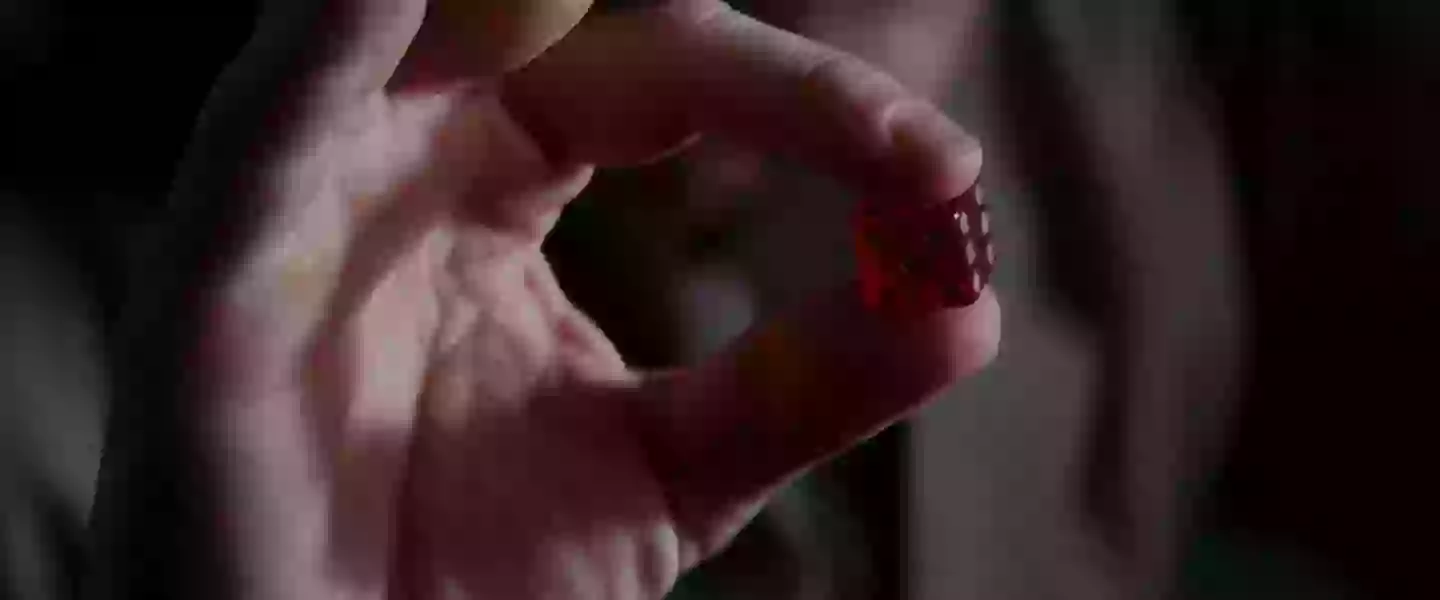 The loaded dice makes sense as a totem, something which can't be said for Cobb's (Warner Brothers)