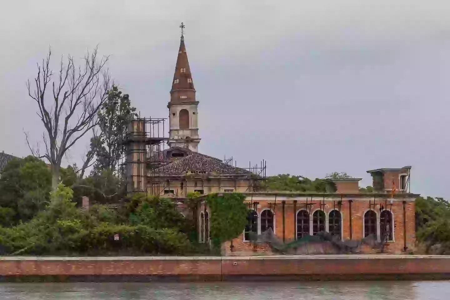 The historic hospital and bell tower, now in a state of disrepair (Marco Di Lauro/Getty Images)