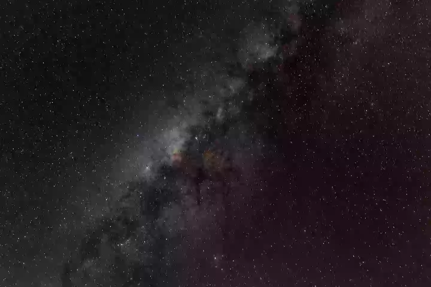 The Milky Way (pictured) could merge with its fellow galaxy if they do collide, but the Earth probably won't be here to see it anyway (John Moore/Getty Images)