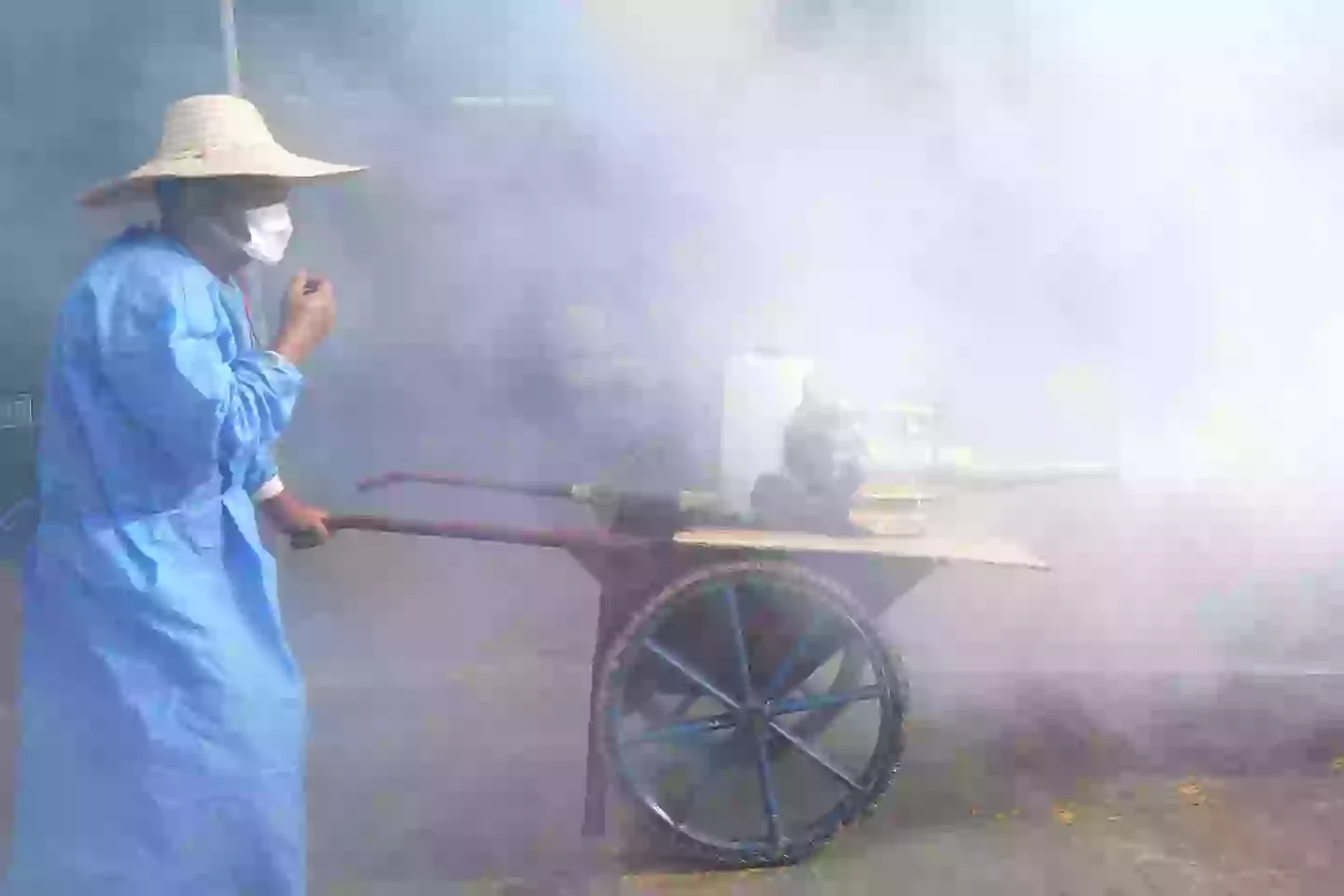 They're spraying insecticide in China to try and kill mosquitoes that spread the virus (VCG/VCG via Getty Images)