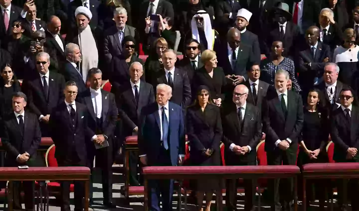Viewers could spot Donald Trump a mile off among the sea of black suits (MANDEL NGAN/AFP via Getty Images)