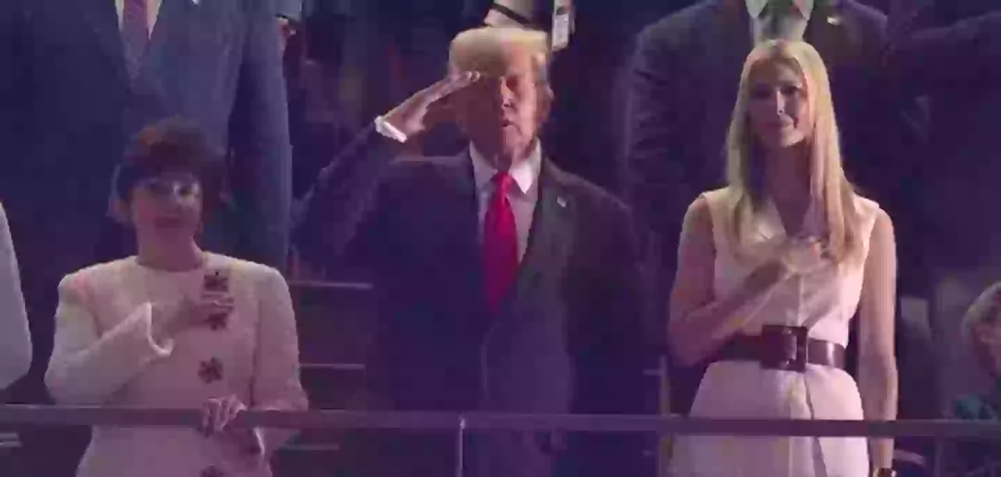 Donald Trump saluted as the national anthem was being sang (Fox)