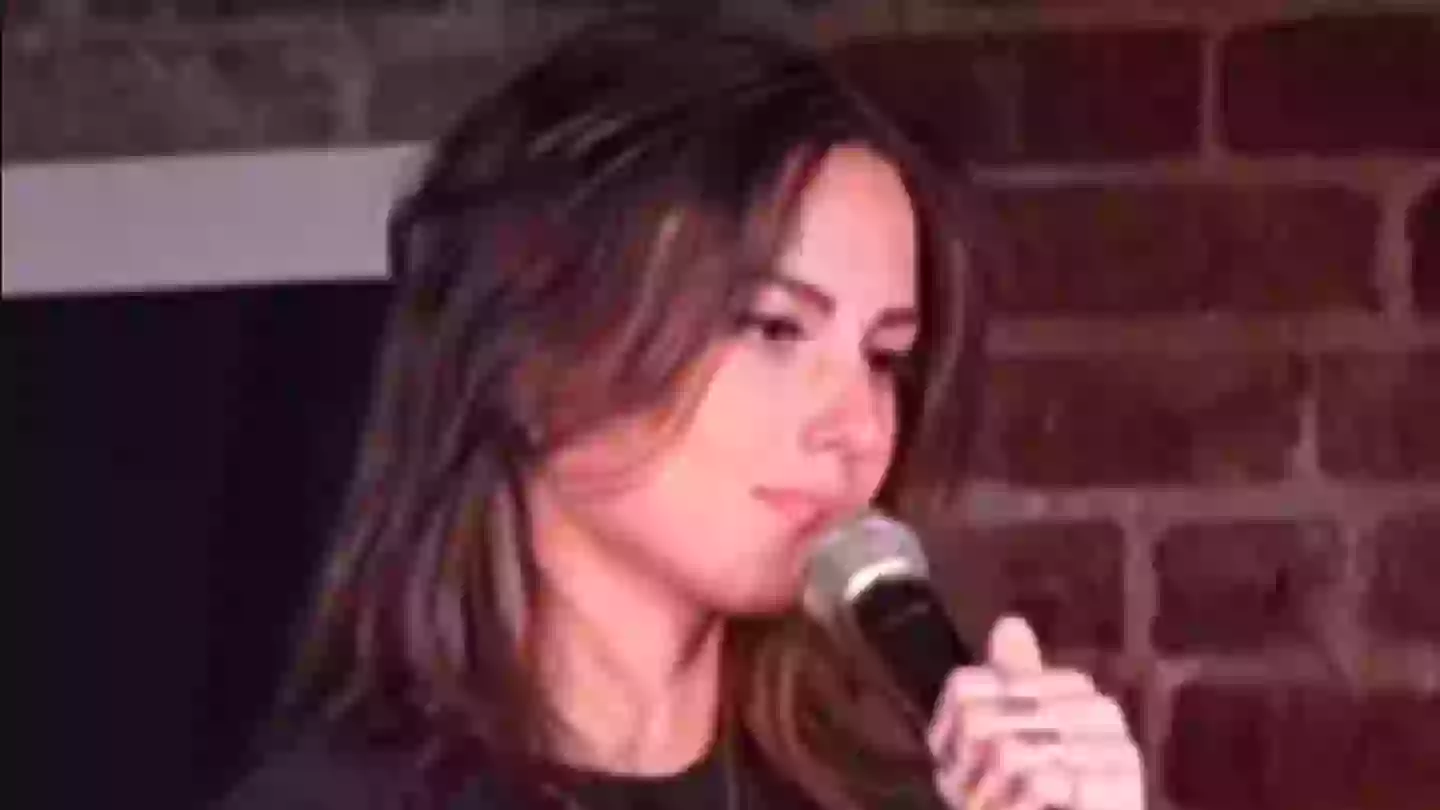 Furious comedian loses it with heckler then grabs his friend's phone to expose his text messages