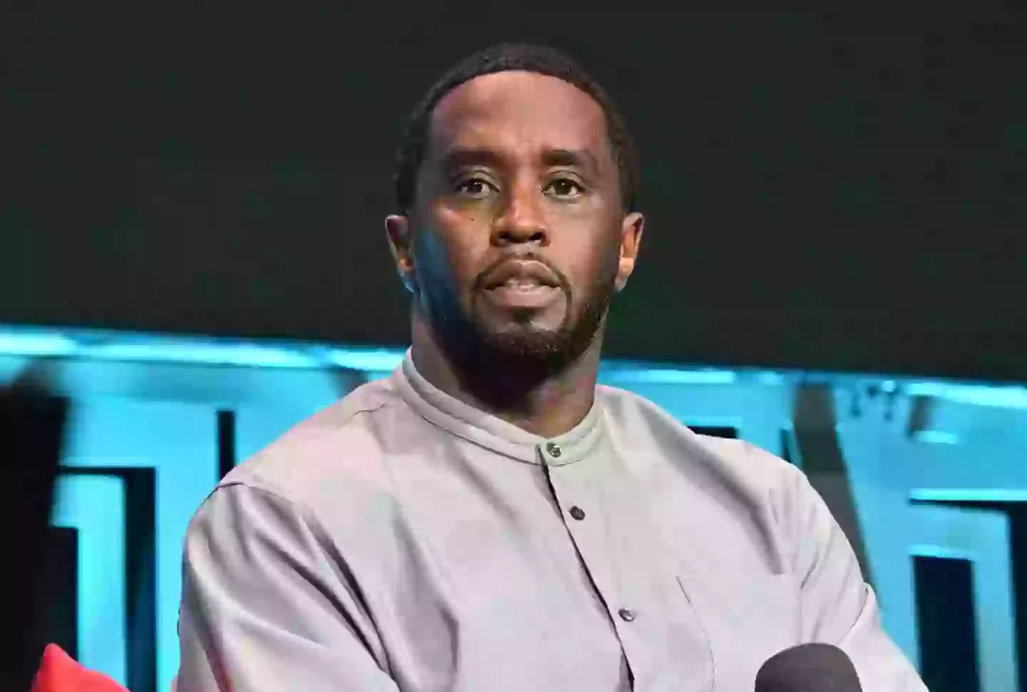 The hip-hop producer faces charges of racketeering, sex trafficking and transportation to engage in prostitution, which he denies (Paras Griffin/Getty Images)