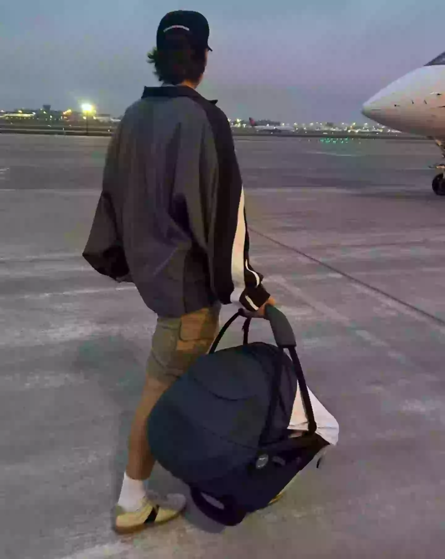 Brown shared a sweet snap showing her husband carrying their daughter (Instagram/@milliebobbybrown)