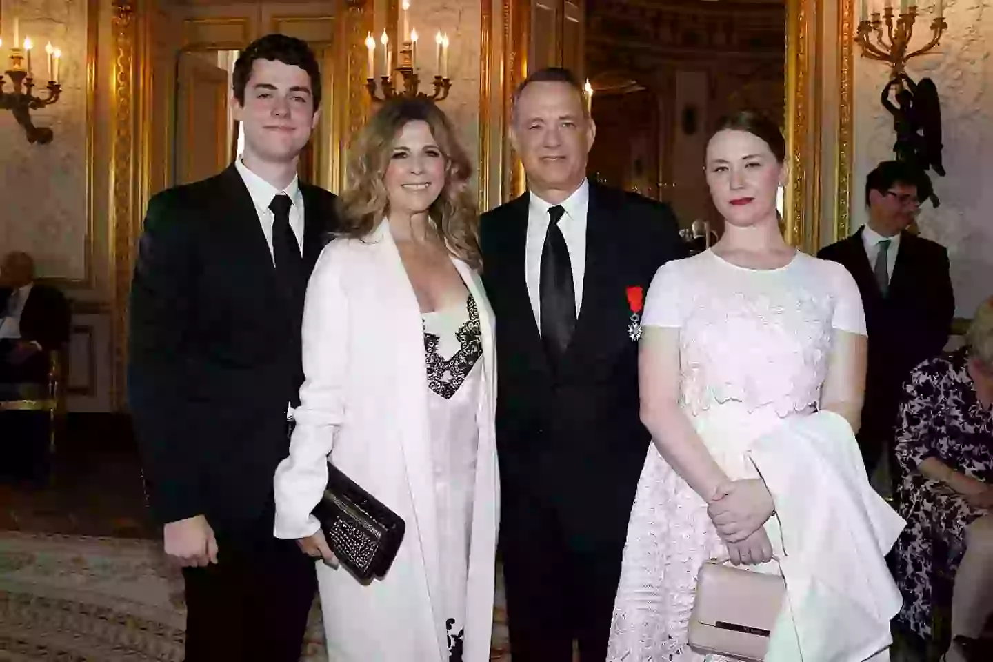 E.A Hanks (right) pictured with her half-brother Truman, their dad Tom Hanks and his wife Rita Wilson (Bertrand Rindoff Petroff/Getty Images)