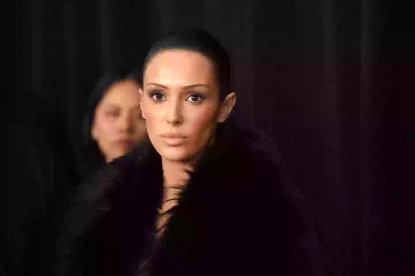 Censori wearing her fur coat before it was taken off for the viral moment (Jeff Kravitz/FilmMagic)