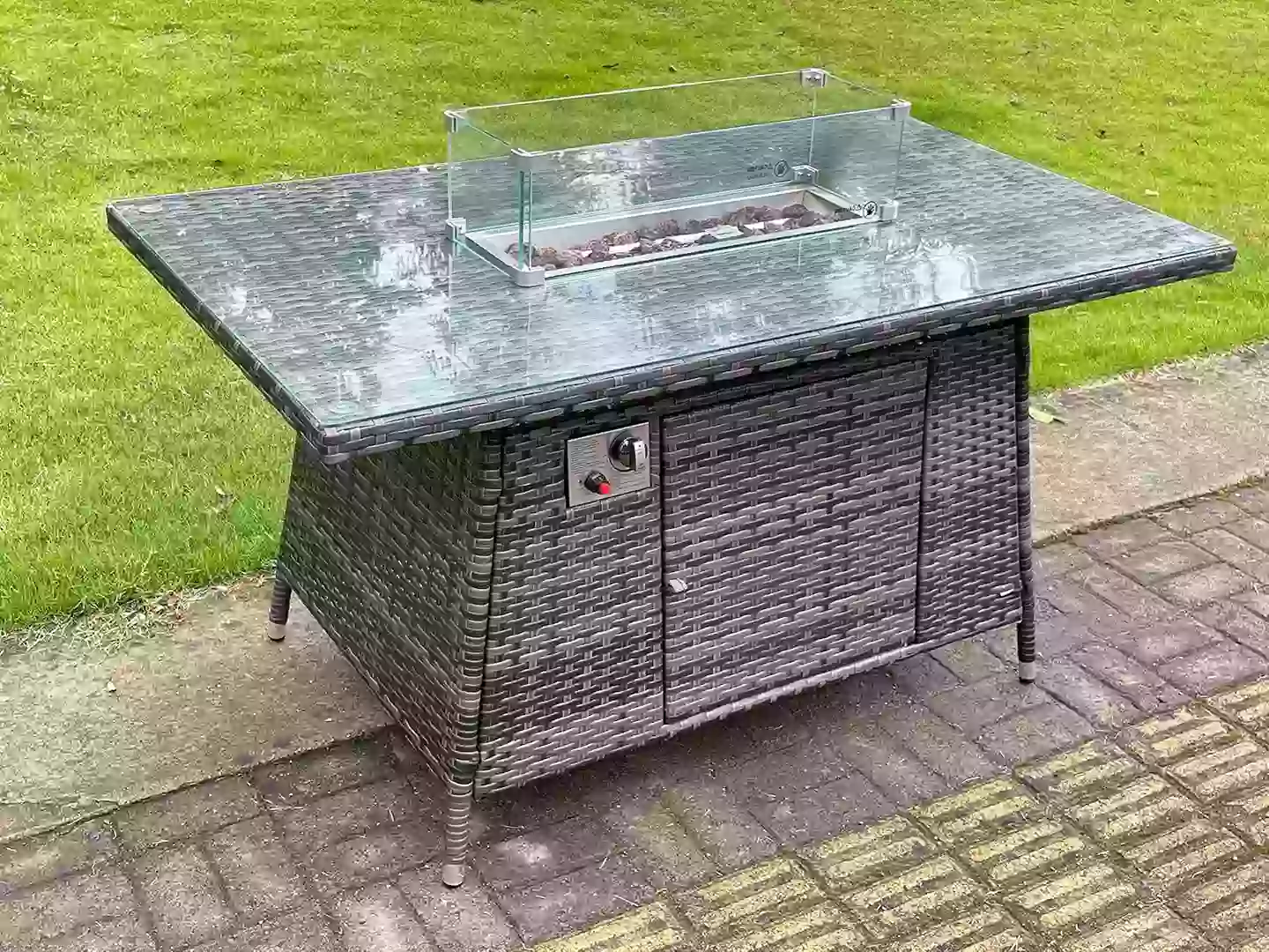 The table comes complete with a fire pit (