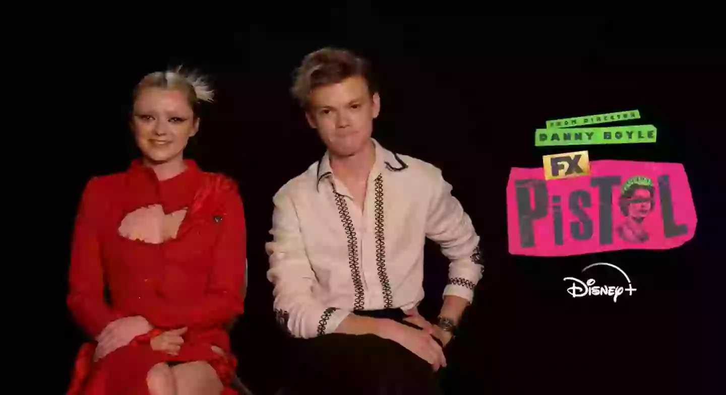 Pistol alongside co-star Thomas Brodie-Sangster.