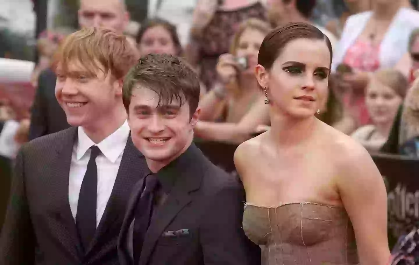 Daniel Radcliffe, Emma Watson and Rupert Grint have each criticised the author's controversial comments (Jim Spellman/Getty)