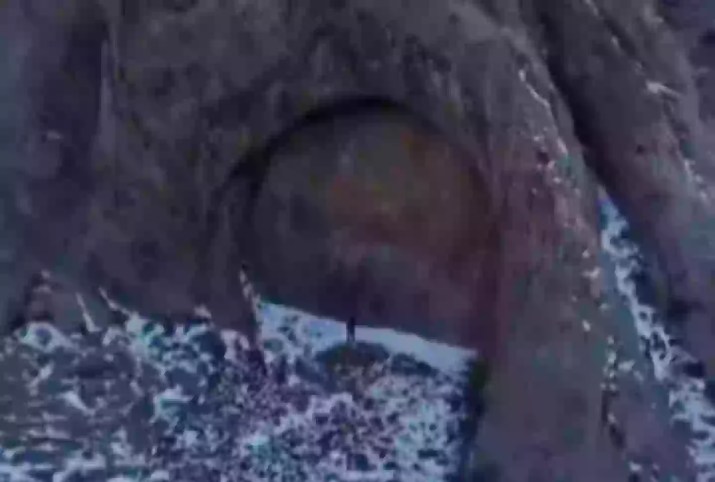 People online were left perplexed by the 'door' shape in the Dzungarian Alatau mountain range (Reddit)