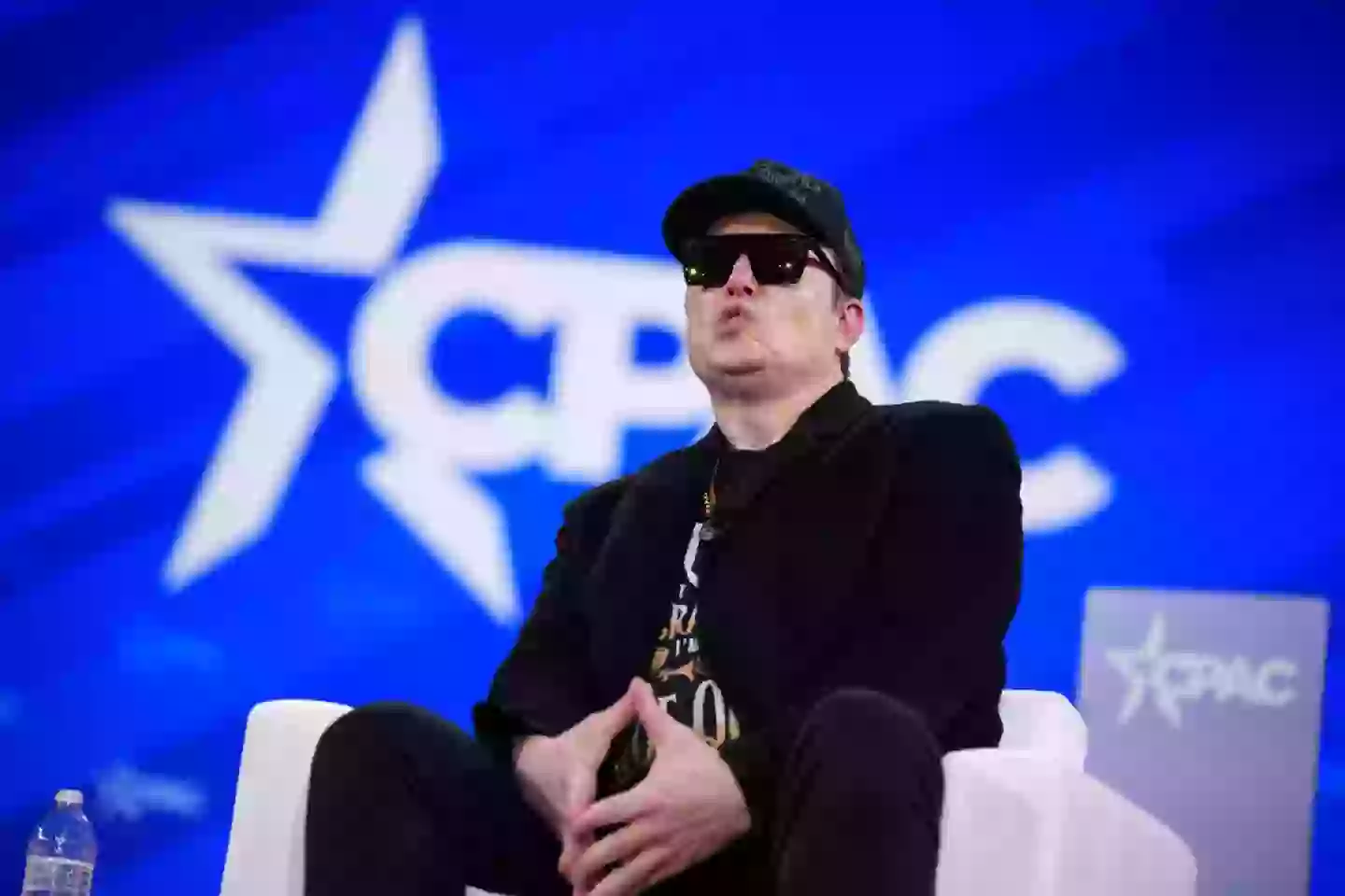 Musk, pictured earlier this week, is allegedly the father of St Clair's child ( Andrew Harnik/Getty Images)
