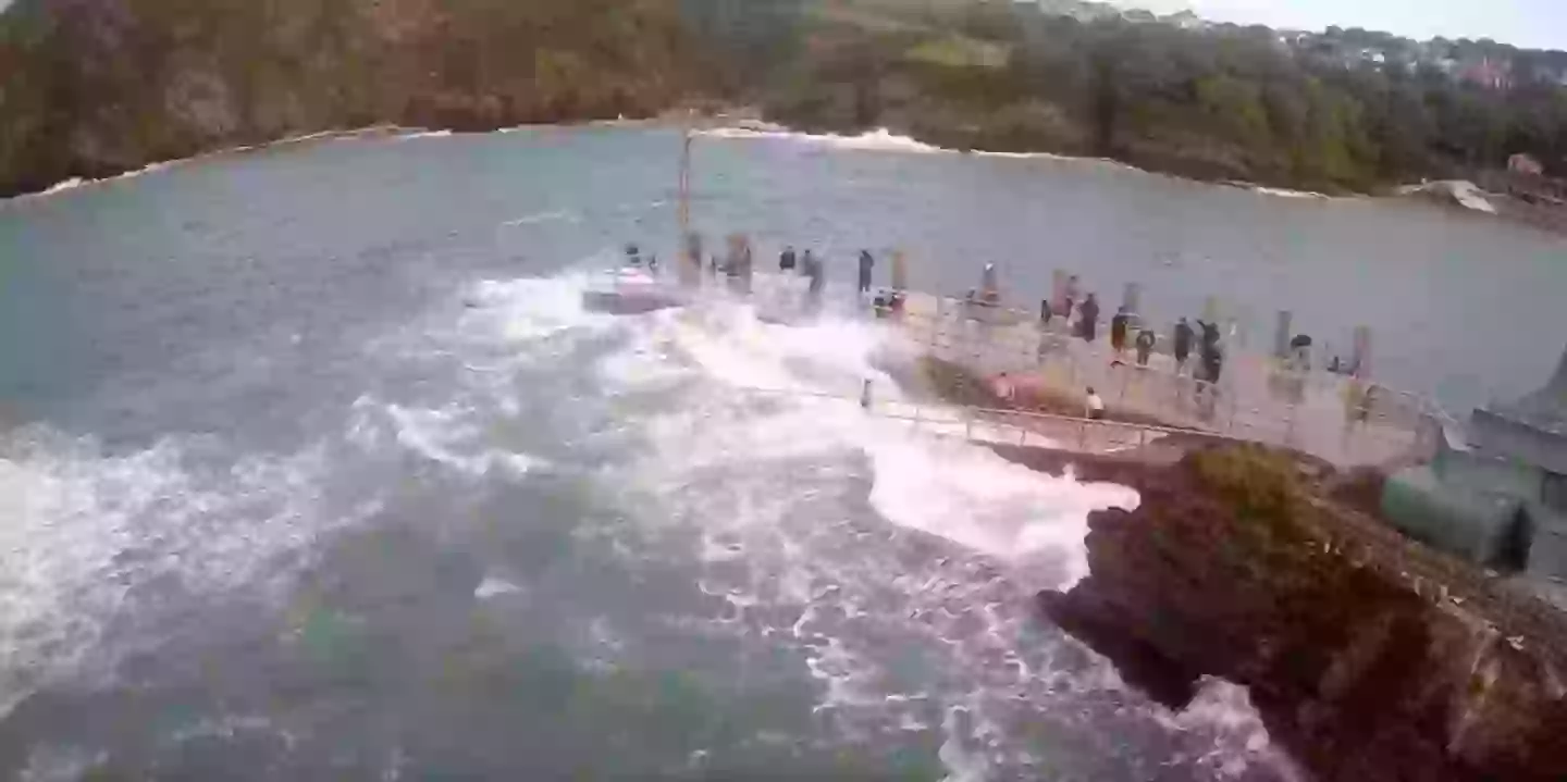 The girl was standing on the slipway when the wave stuck.