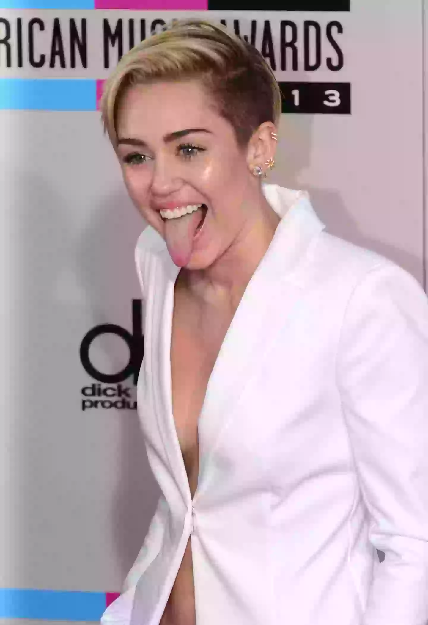 Miley Cyrus likes sticking her tongue out.