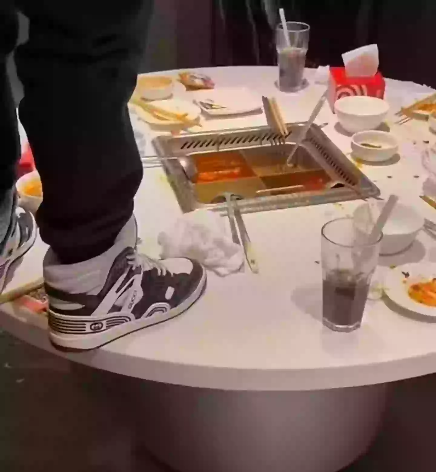 The vile footage of the teenagers urinating into a broth has sparked outrage (X)