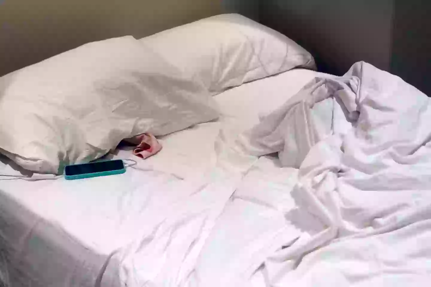 Charging it while you snooze might not be best in the long-run. (Getty Stock)