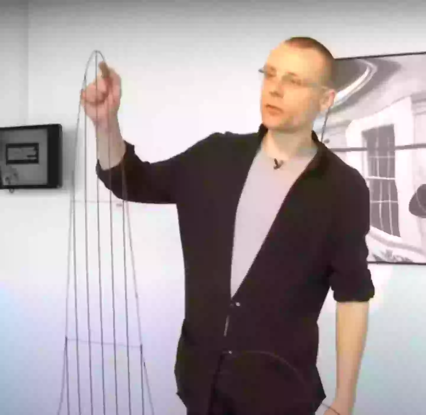 Julijonas Urbonas and his model of the Euthanasia Coaster (YouTube / Science Gallery Dublin)