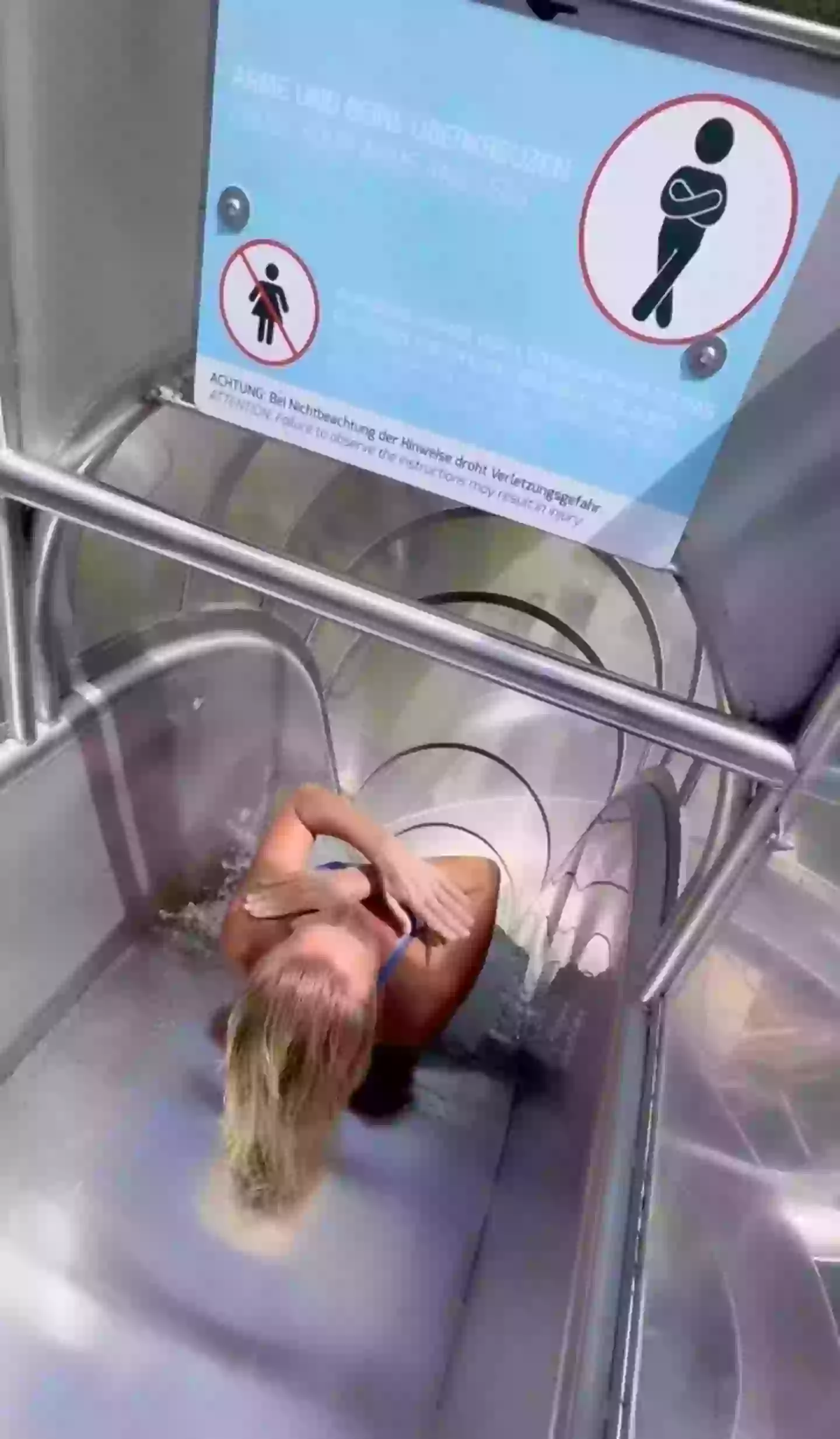 Rhiannan Iffland went down the male-only waterslide despite the warning signs (Instagram/@rhiannan_iffland)