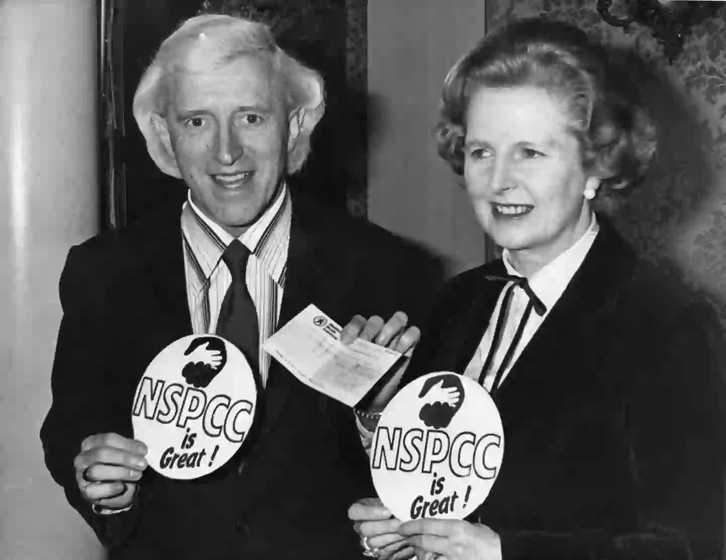 The characters are dressed as Savile (Evening Standard via Getty Images)