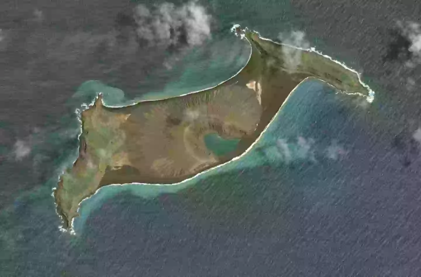Before the huge eruption ripped the island apart (Maxar via Getty Images)