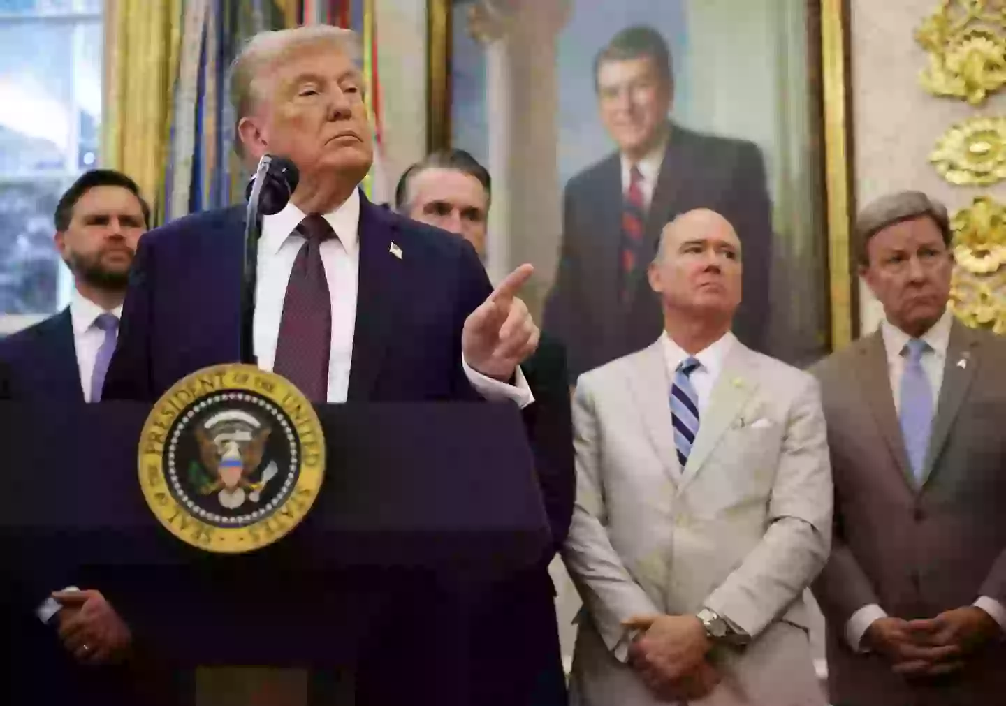 There has been much focus on Donald Trump's hands, but a body language expert said he wasn't trying to hide them (Alex Wong/Getty Images)