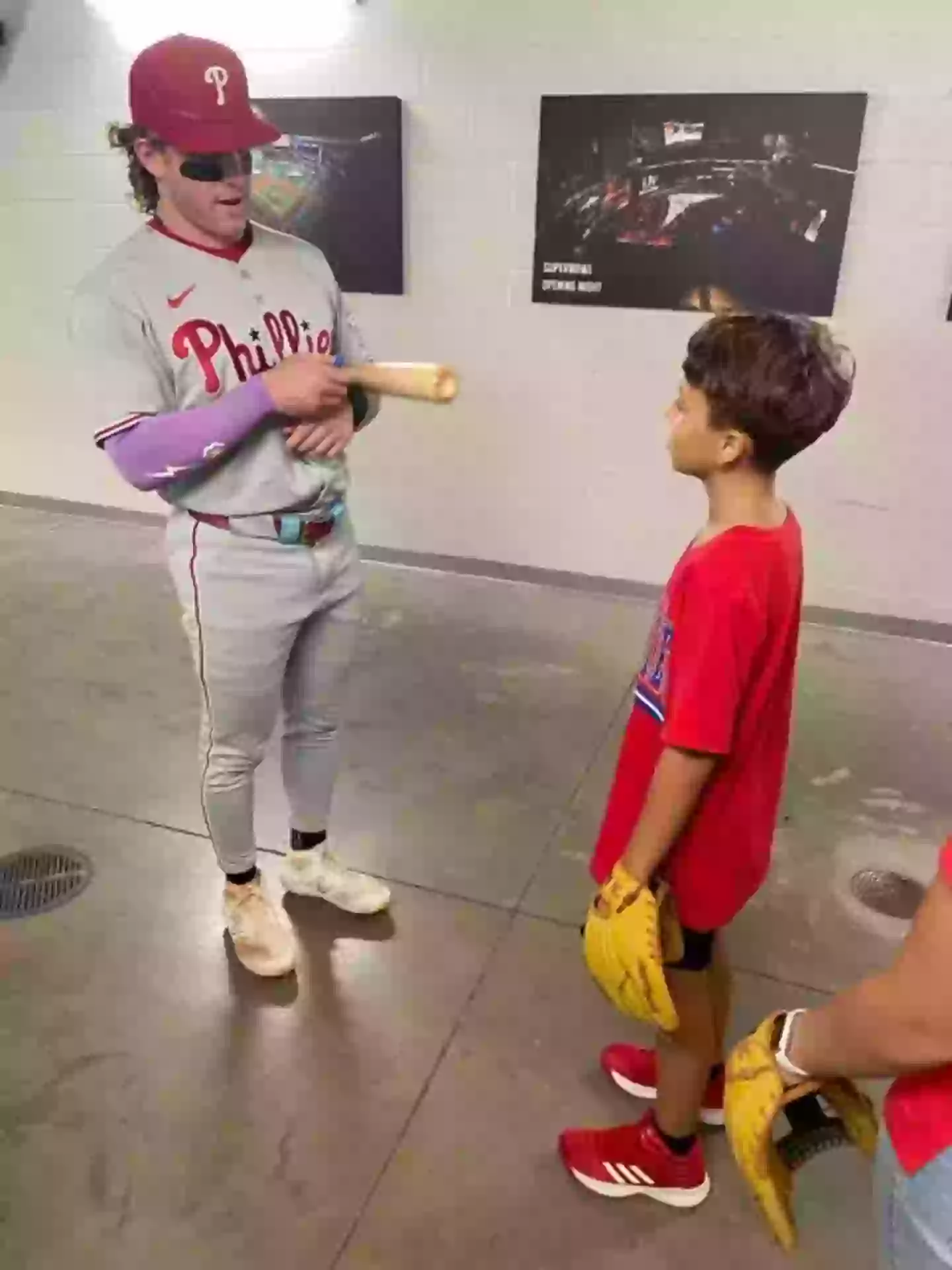 Phillies outfielder Harrison Bader gave the boy a signed bat after the game (X/@Phillies)