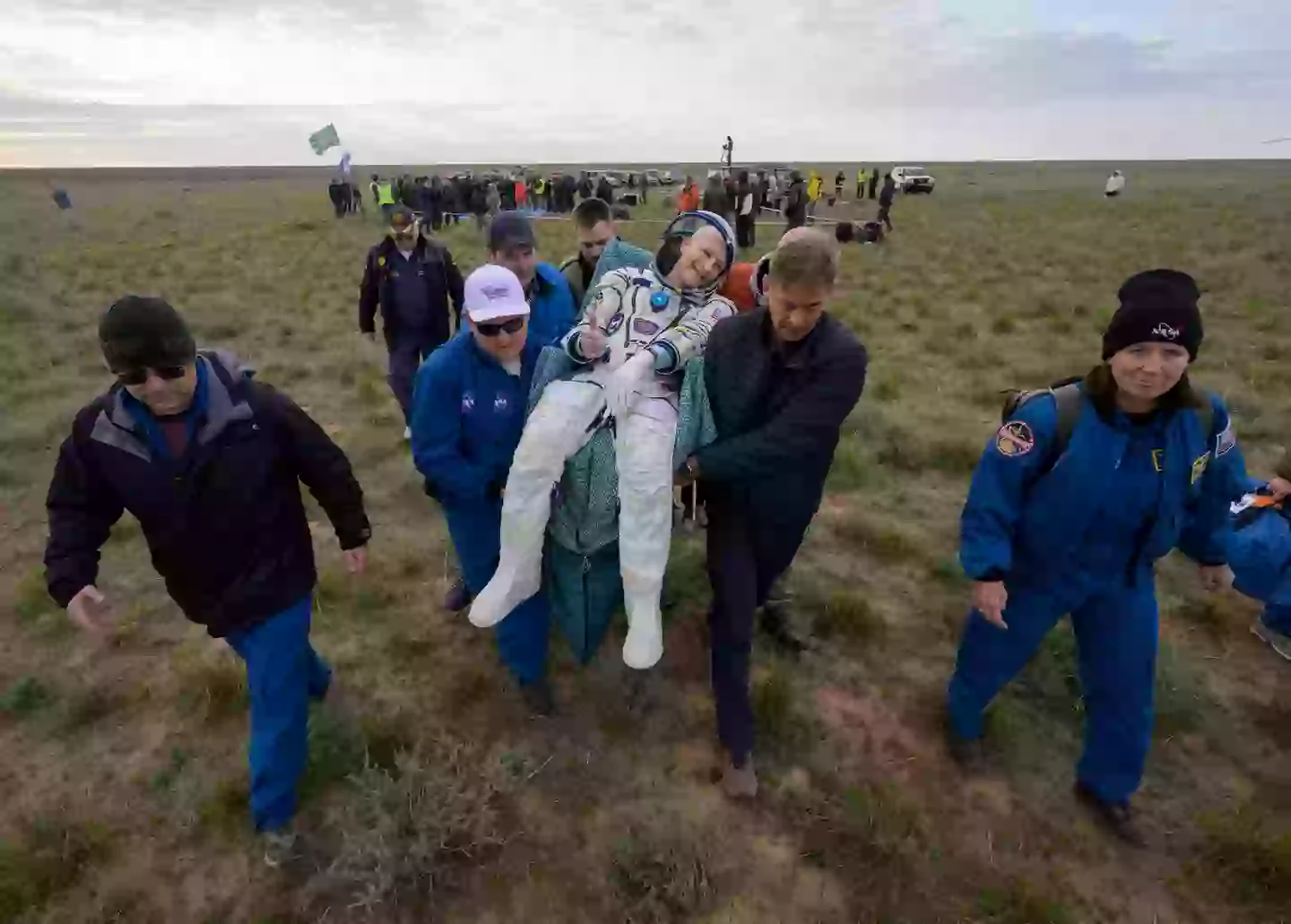 The 70-year-old touched back down on Earth, but sparked health concerns (Bill Ingalls/NASA via Getty Images)