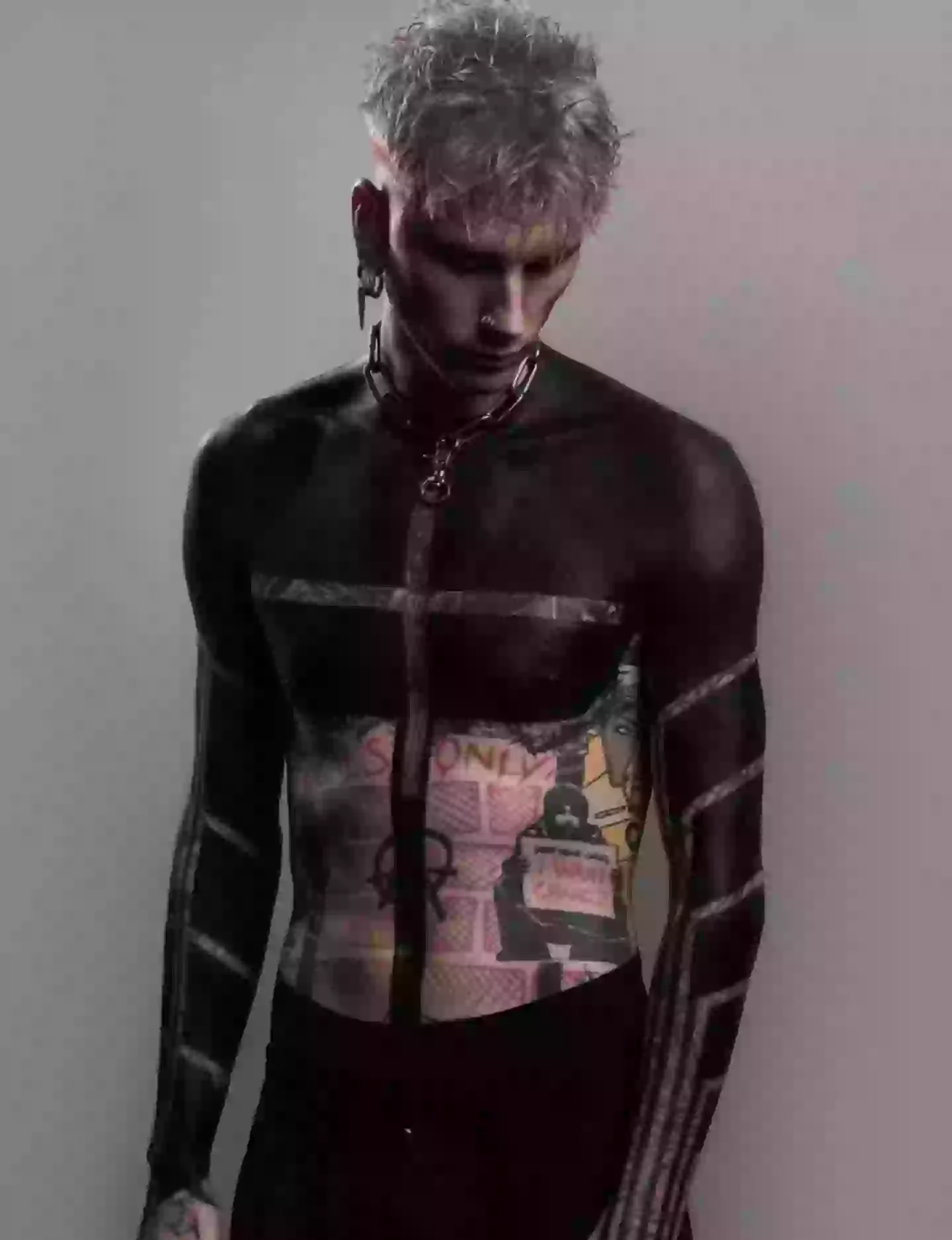 The reason behind Machine Gun Kelly's bold new half body tattoo as he ...