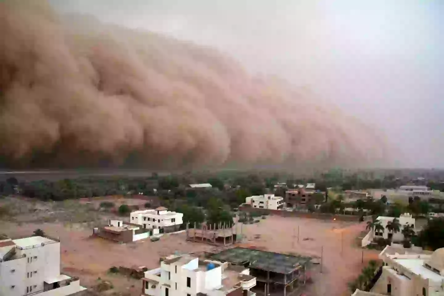 The huge dust cloud is produced by a thunderstorm and known as a haboob (STR/AFP via Getty Images)