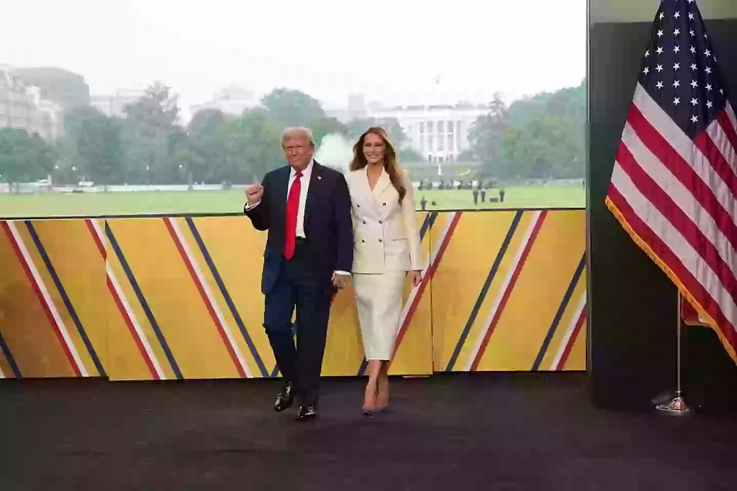 The First Lady was all smiles when she first appeared at Saturday's military event (Doug Mills - Pool/Getty Images)