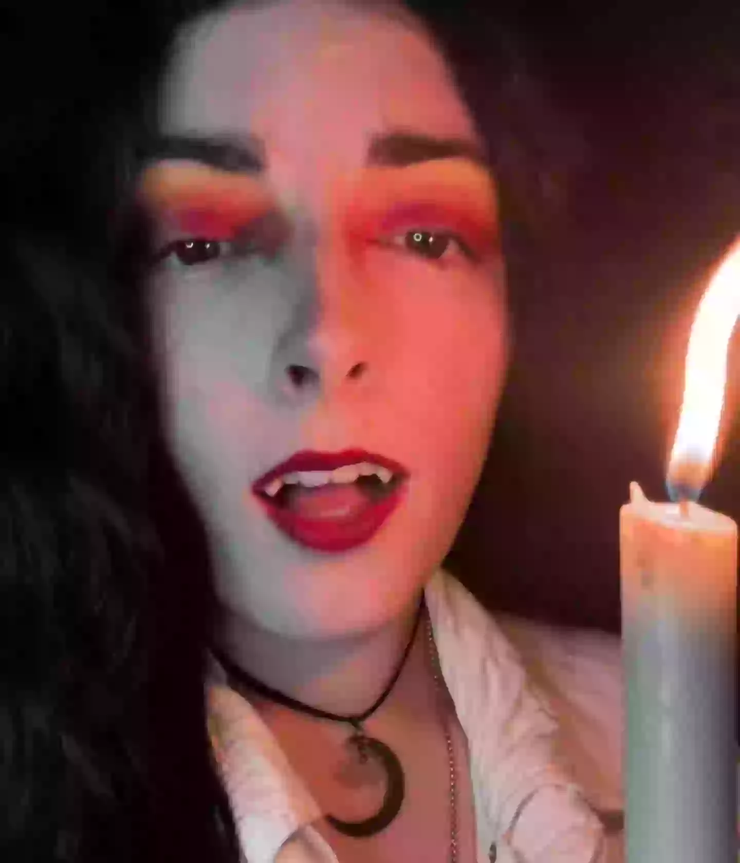 The 'real life vampire' says she feeds off of other peoples energy - as well as 'bloody' sausages (TikTok/@thevampirehellie)