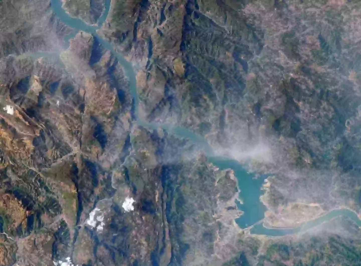 The dam and river photographed from above (NASA)