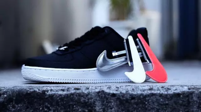 Interchangeable swoosh sales