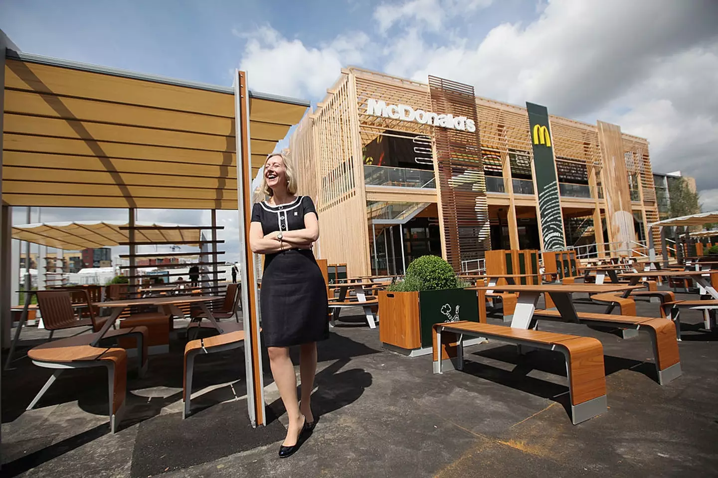 Jill McDonald, the Chief Executive Officer of McDonald's UK, poses for a photograph in front of the world's largest McDonald's restaurant. (Oli Scarff/Getty Images)