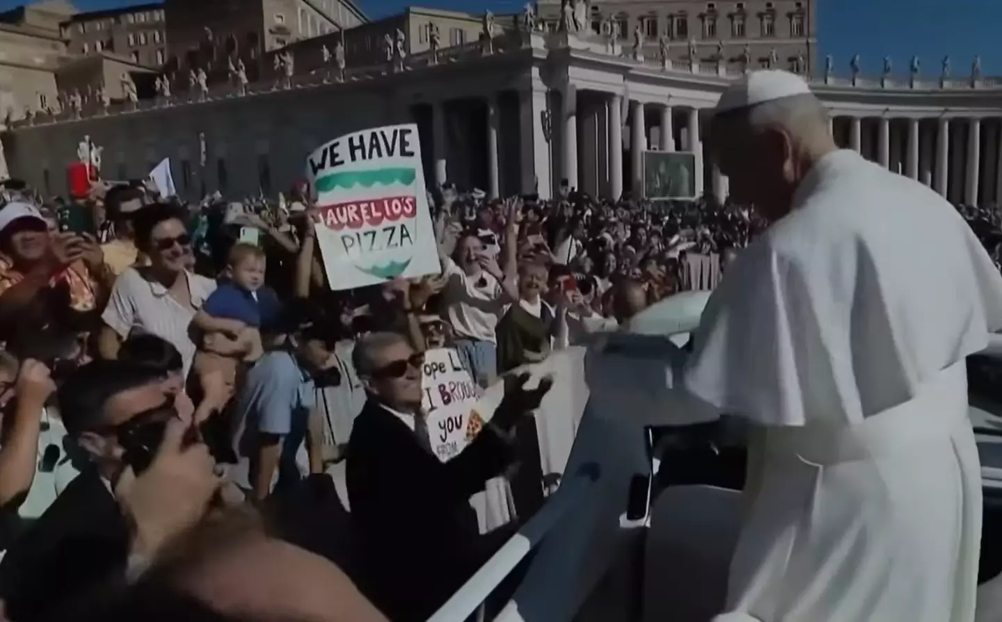 Pope Leo and the Aurelio's Pizza sign (NBC)