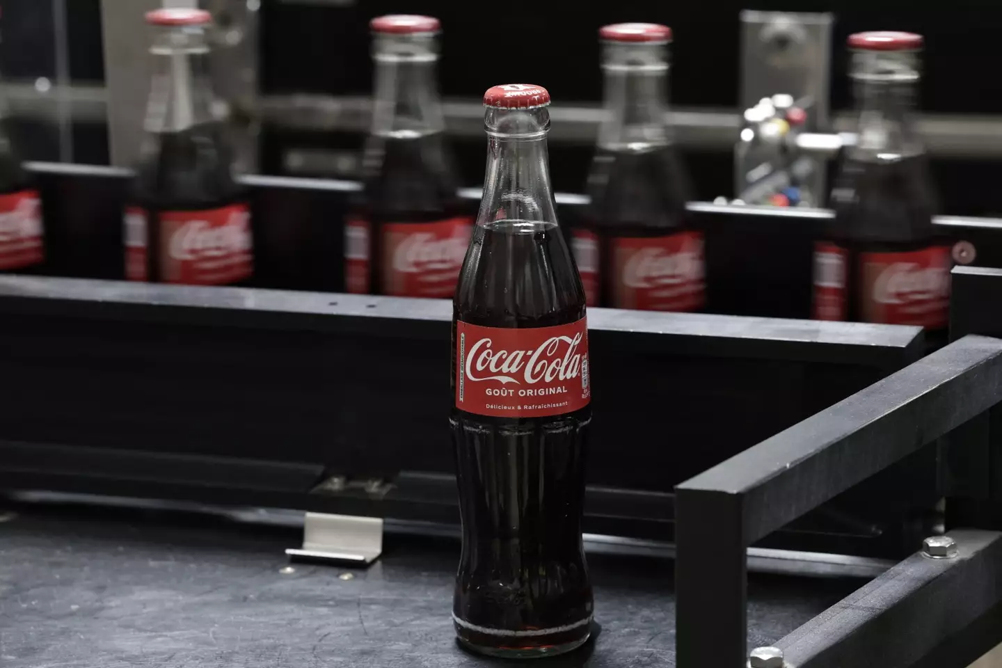 The glass bottle is an iconic design (STEPHANE DE SAKUTIN/AFP via Getty Images)