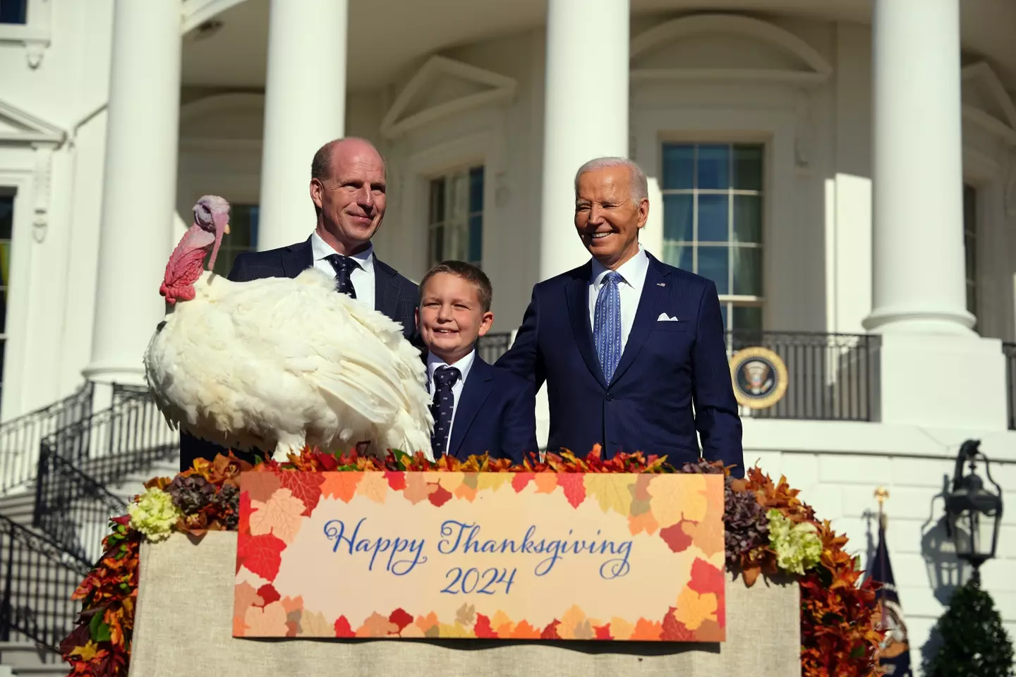 Trump said that Biden's previous pardon of a turkey called Peach, seen here, was 'invalid' (Andrew Harnik/Getty Images)