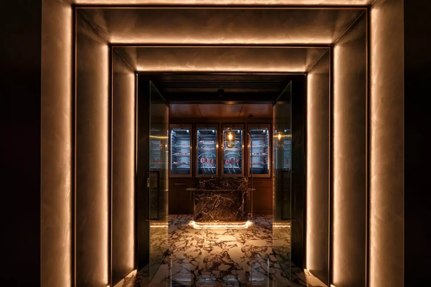 The entrance is designed to mimic an NFL stadium's tunnel (Noble 33)