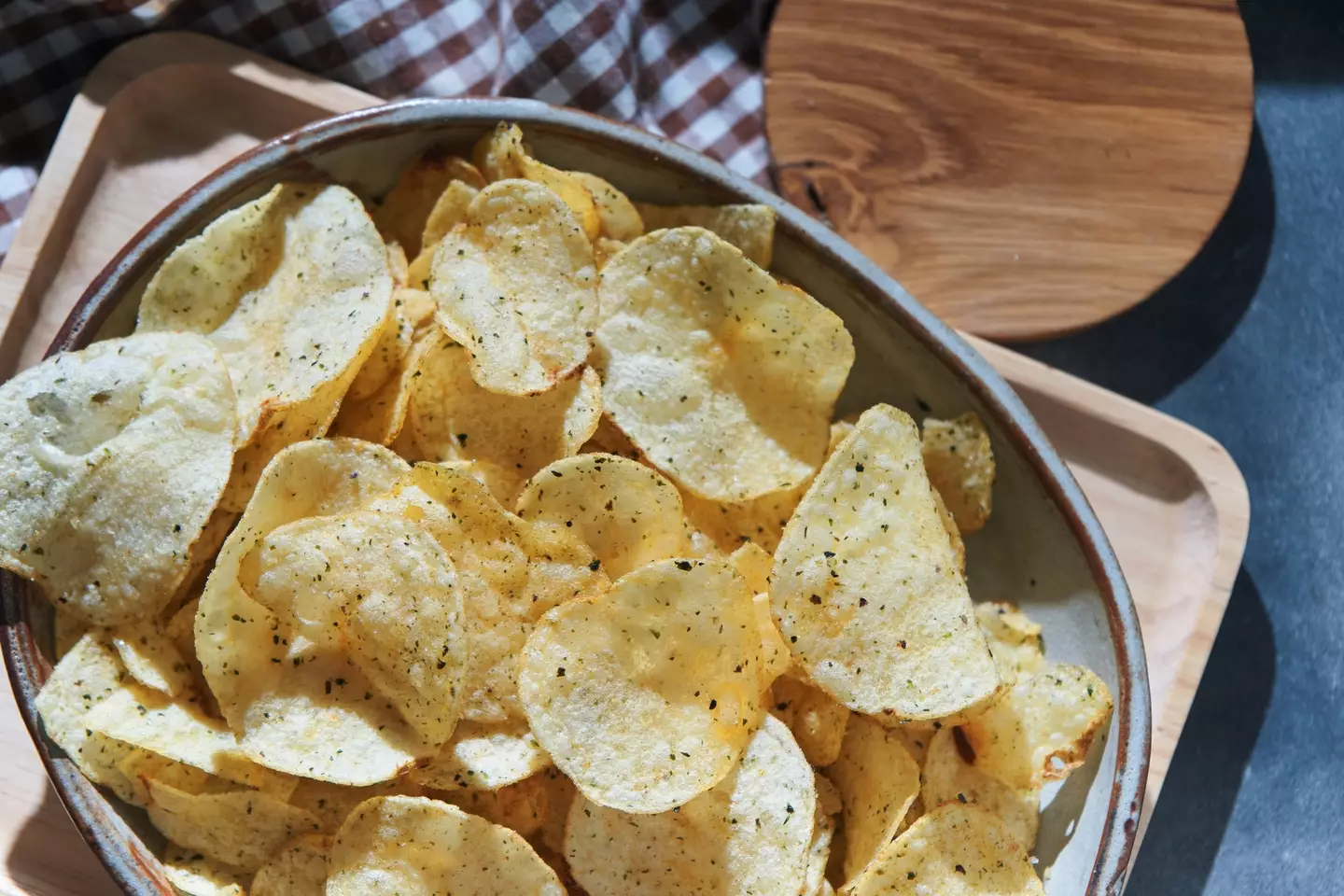 UPFs like crisps, cakes, sweets and pizzas could be slowing your brain down (Krit of Studio OMG/Getty Images)