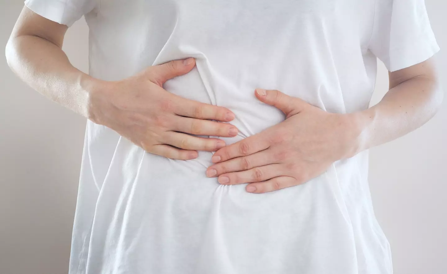 A woman with a stomach ache - DKart via Getty Images