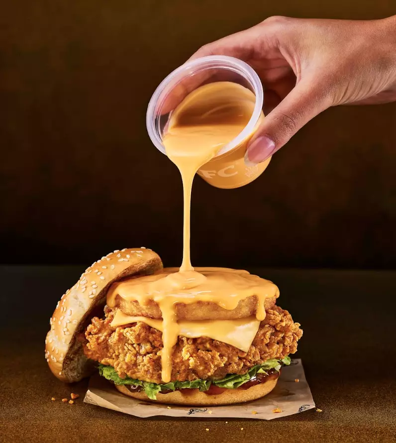 The new Cheesy Melt Burger is available for six weeks (KFC)
