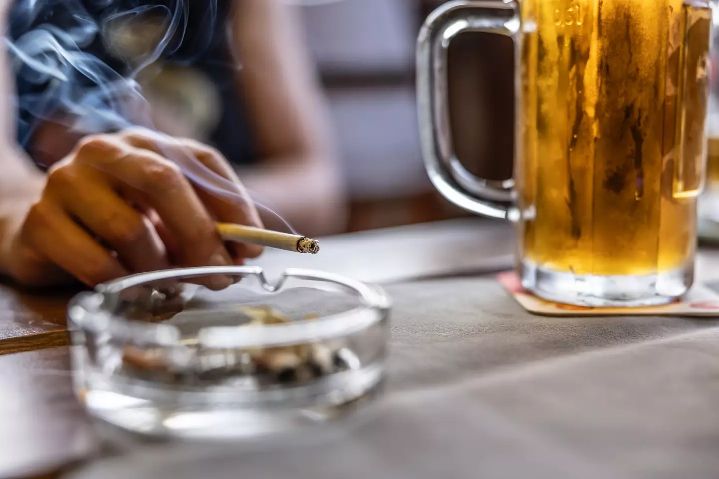 A pint and a cigarette - Simple Images via Getty Images