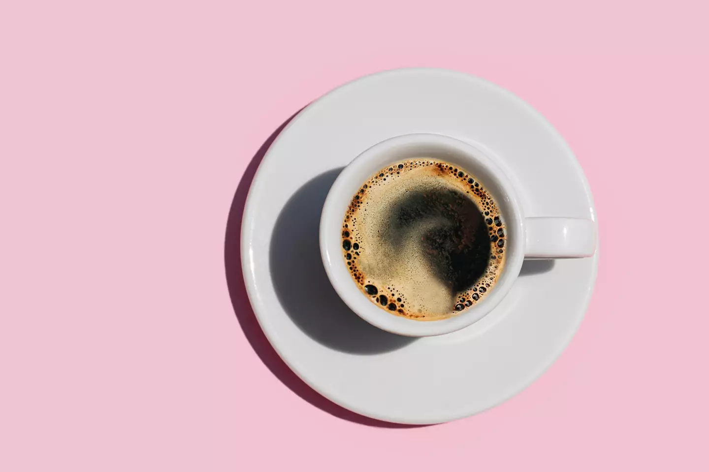 Eat something before having your morning coffee and you could mitigate the risk of heartburn (Iryna Veklich/Getty Images)