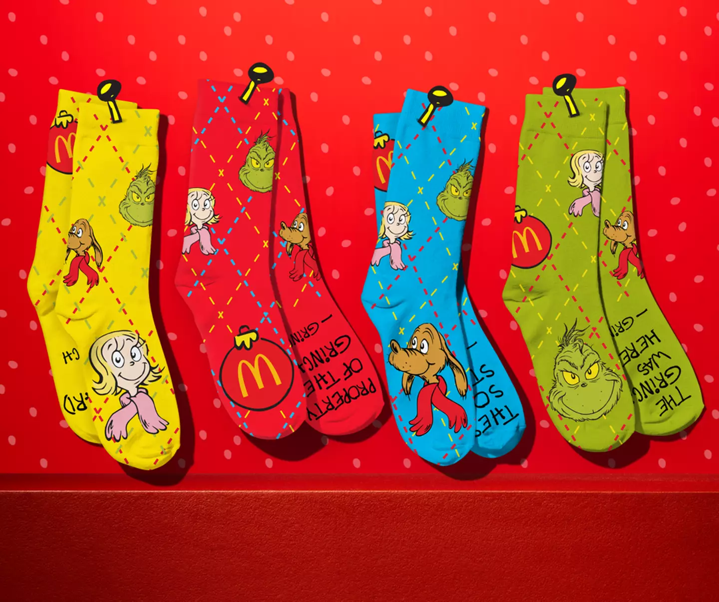 Each Grinch Meal comes with a pair of socks, featuring classic Dr. Seuss characters (McDonald's)